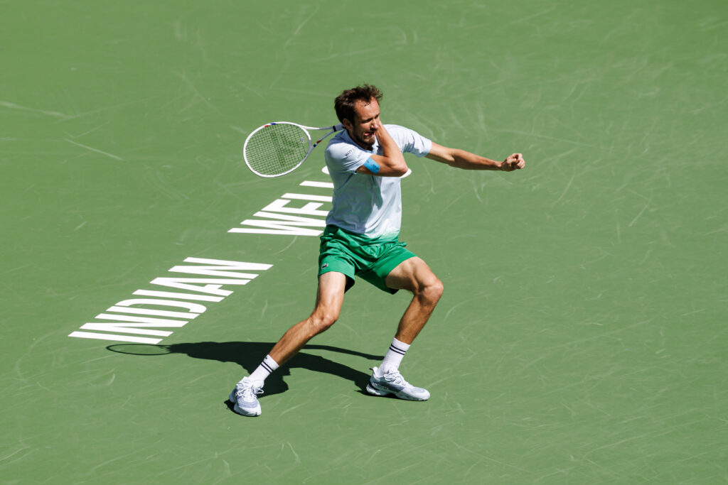Daniil Medvedev of Russia hits a forehand against Holger Rune of Denmark in the semi-final of the men's singles at the BNP Paribas Open at Indian Wells Tennis Garden on March 15, 2025 in Indian Wells, California.