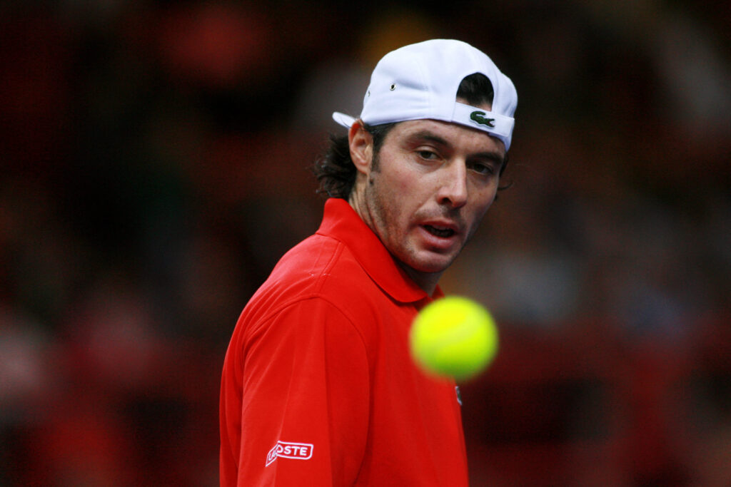 France's Sebastien Grosjean is thrown a ball as he faces Spain's Tommy Robredo during their Paris Tennis Masters Series second round match at Bercy indoor tournament, 01st November 2006.