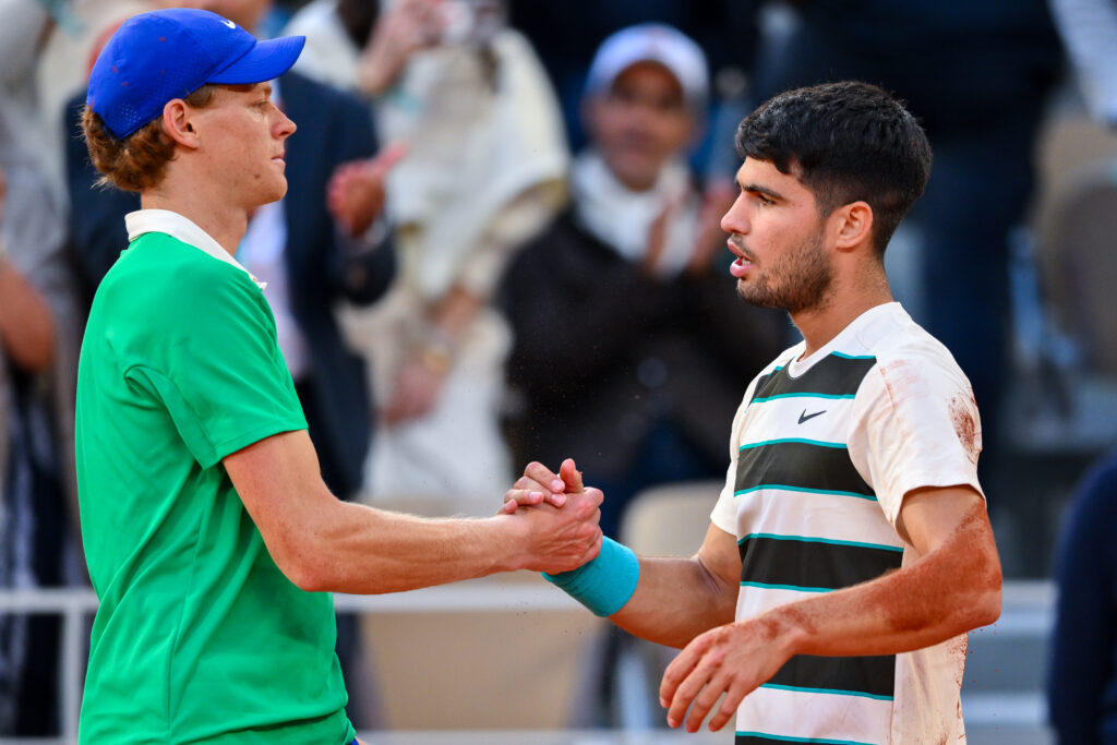 Carlos Alcaraz of Spain shakes hands with Jannik Sinner of Italy following the Men’s Singles Final match on Day Fifteen of the 2025 French Open at Roland Garros on June 08, 2025 in Paris, France.