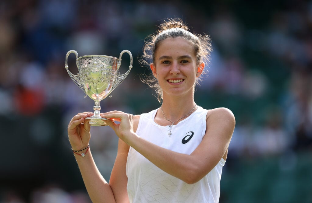 Mia Pohankova of Slovakia poses for a photo with the Girl's Singles Trophy following victory against Julieta Pareja of United States in the Girl's singles final on day thirteen of The Championships Wimbledon 2025 at All England Lawn Tennis and Croquet Club on July 12, 2025 in London, England.