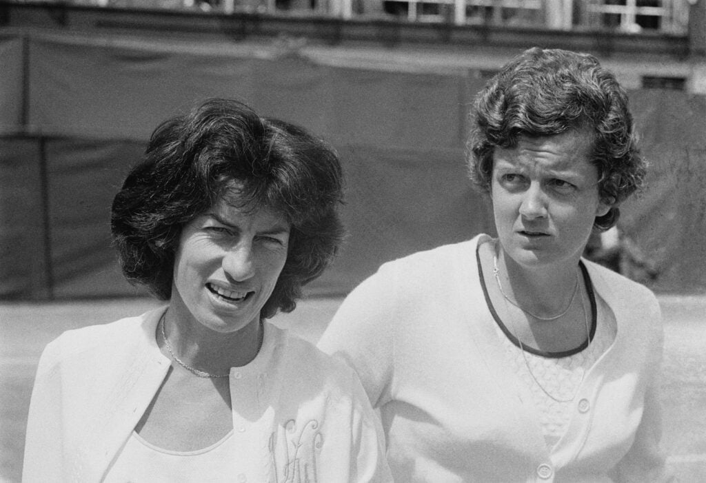British tennis player Virginia Wade and her Dutch opponent, Betty Stove, during their Wimbledon Championships women's doubles semifinal at the All England Lawn Tennis and Croquet Club in Wimbledon, London, England, 30th June 1977. Stove and her doubles partner, Martina Navratilova, won the game 6-8, 6-2, 6-2.