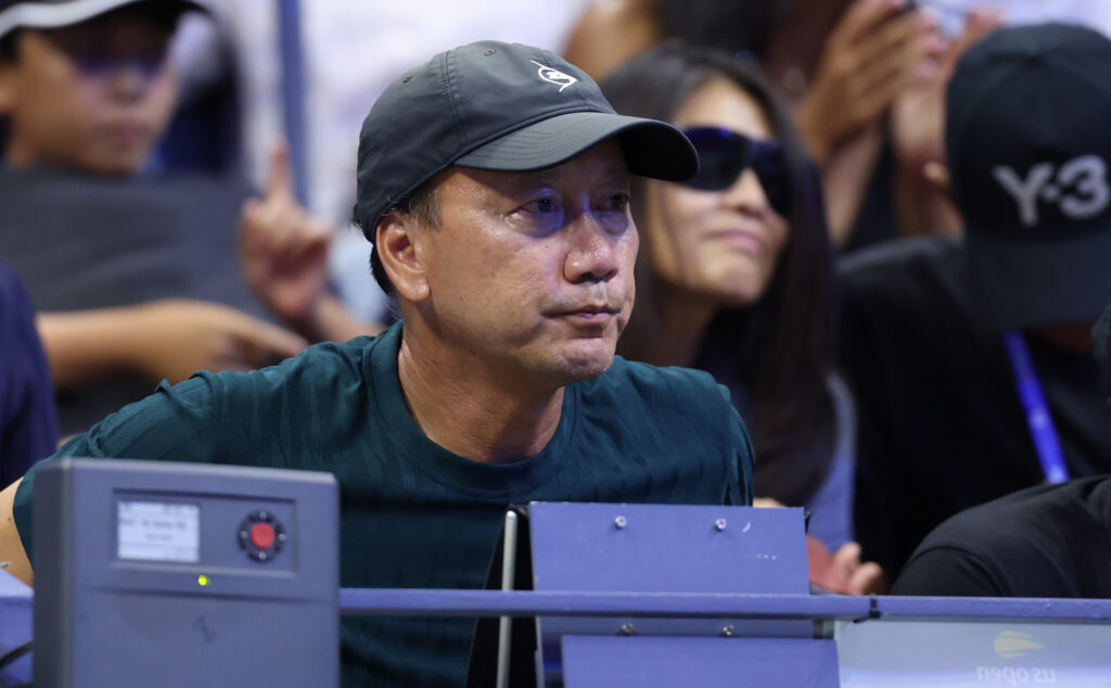 Former American tennis player Michael Chang looks on during the Men's Singles First Round match between Novak Djokovic of Serbia and Learner Tien of the United States on Day One of the 2025 US Open at USTA Billie Jean King National Tennis Center on August 24, 2025 in the Flushing neighborhood of the Queens borough of New York City.