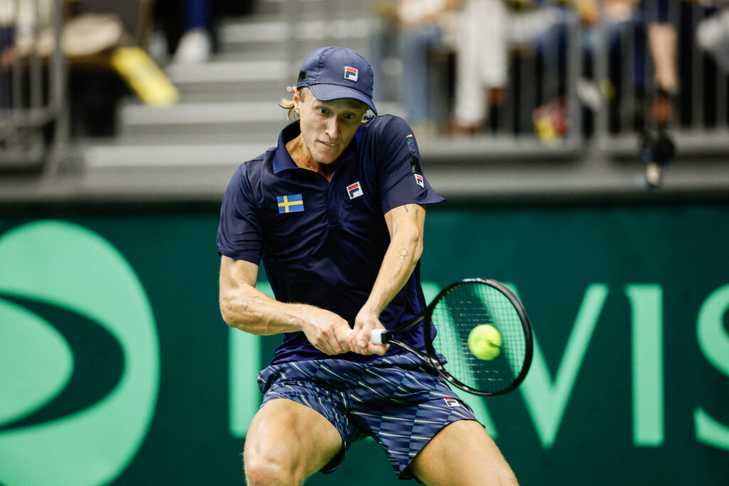 Sweden's Leo Borg returns the ball during the singles match against Tunisia's Moez Echargui (not pictured) in the Davis Cup match between Sweden and Tunisia in Partille, Sweden, on September 12, 2025.