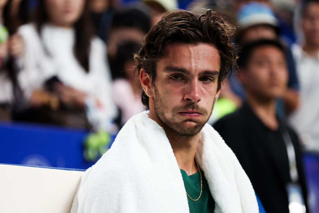 Lorenzo Musetti of Italy shows his dejection after against Alejandro Tabilo of Chile after the men's singles final match in the 2025 ATP Chengdu Open at Sichuan International Tennis Center on September 23, 2025 in Chengdu, China.