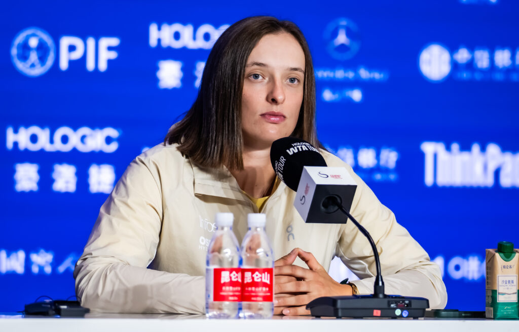 Iga Swiatek of Poland talks to the media after defeating Camila Osorio of Colombia in the third round on Day 8 of the China Open at National Tennis Center on September 29, 2025 in Beijing, China