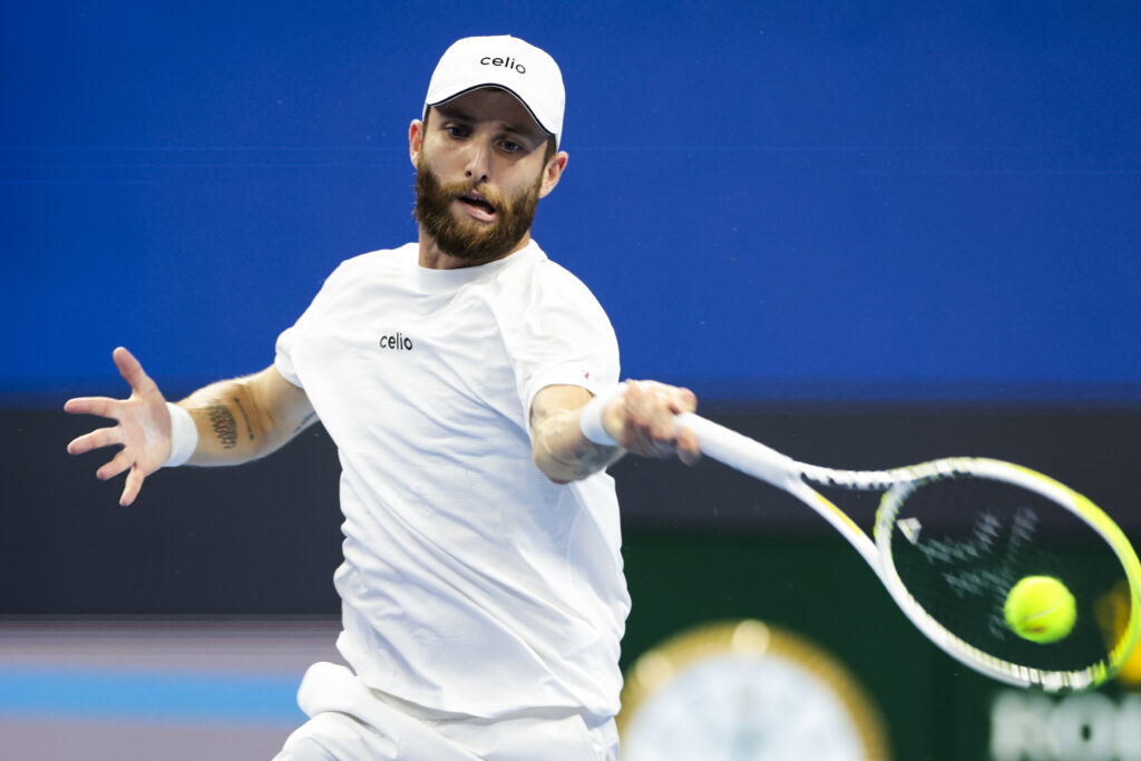 Corentin Moutet of France returns a shot in the Men's Singles Round of 16 match against Alexander Zverev of Germany on day 7 of the 2025 China Open at National Tennis Center on September 28, 2025 in Beijing, China.