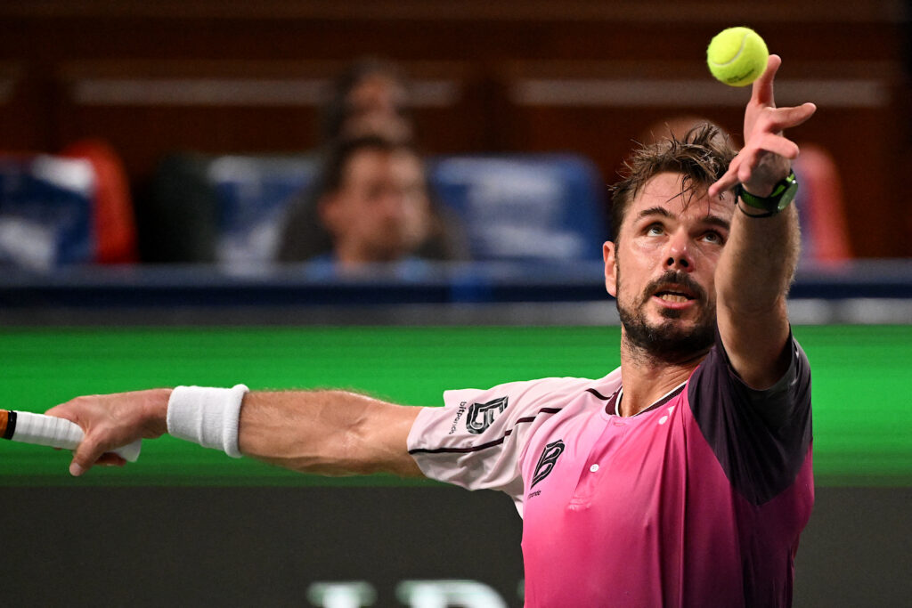 Switzerland's Stan Wawrinka serves to Hungary's Fabian Marozsan in their men's singles match at the Shanghai Masters tennis tournament in Shanghai on October 1, 2025.