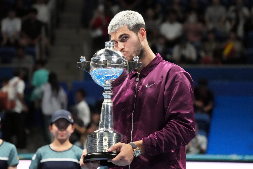 Carlos Alcaraz of Spain poses with the trophy after defeating against Taylor Fritz of United States during the Singles Final on day seven of Kinoshita Group Japan Open at Ariake Colosseum on September 30, 2025 in Tokyo, Japan.