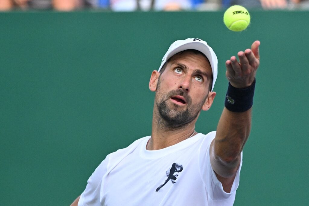 Serbia's Novak Djokovic serves during a training session at the Shanghai Masters tennis tournament in Shanghai on October 2, 2025.