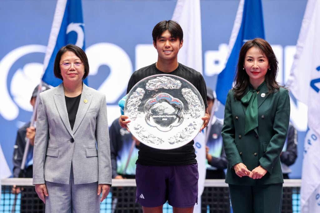Runner-up Learner Tien of the United States poses with trophy after the Men's Singles Final match on day 10 of the 2025 China Open at the National Tennis Center on October 1, 2025 in Beijing, China.