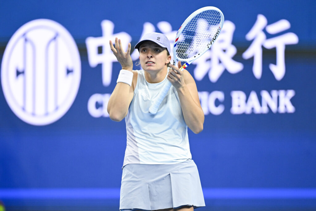 Iga Swiatek of Poland reacts in the Women's Singles Fourth Round match against Emma Navarro of the United States on day 10 of 2025 China Open at National Tennis Center on October 01, 2025 in Beijing, China.