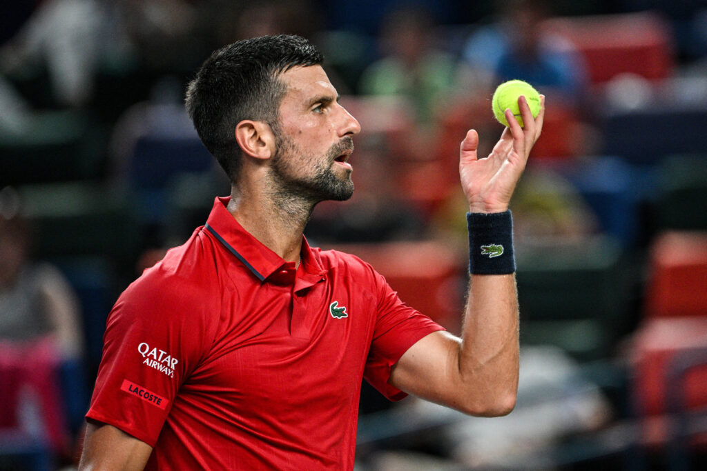Serbia's Novak Djokovic gestures during his men's singles match against Germany's Yannick Hanfmann at the Shanghai Masters tennis tournament in Shanghai on October 5, 2025.