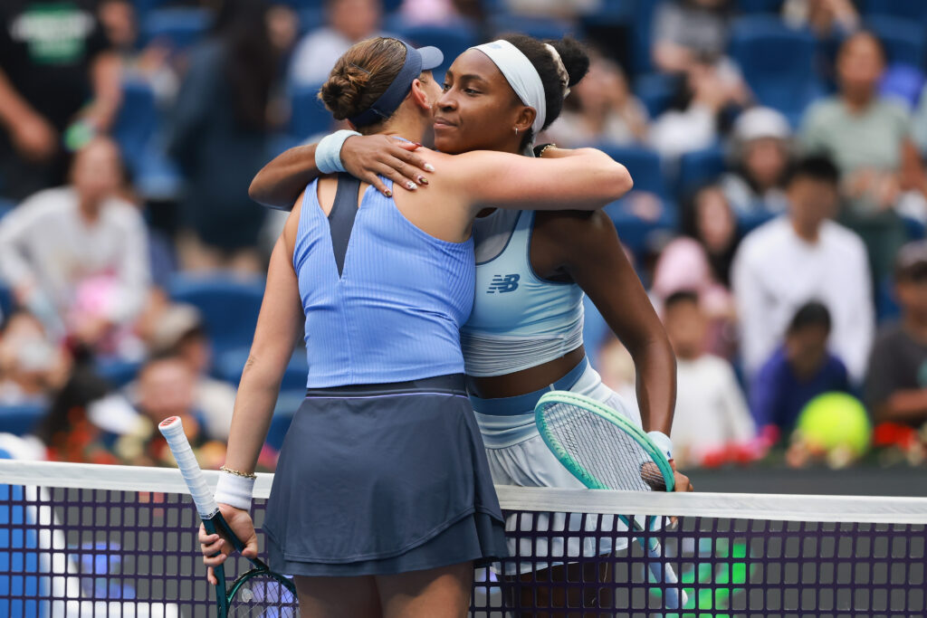 Coco Gauff of the United States shake hands with Amanda Anisimova of the United States at the net after the Women's Singles Semifinal match on day 13 of the 2025 China Open at National Tennis Center on October 4, 2025 in Beijing, China.