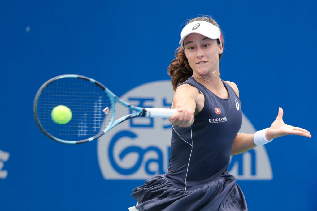 Zeynep Sonmez of Turkey competes in the Women's Singles Qualifying first round match against Wang Yafan of China on day 1 of 2025 Wuhan Open at Optics Valley International Tennis Center on October 4, 2025 in Wuhan, Hubei Province of China.