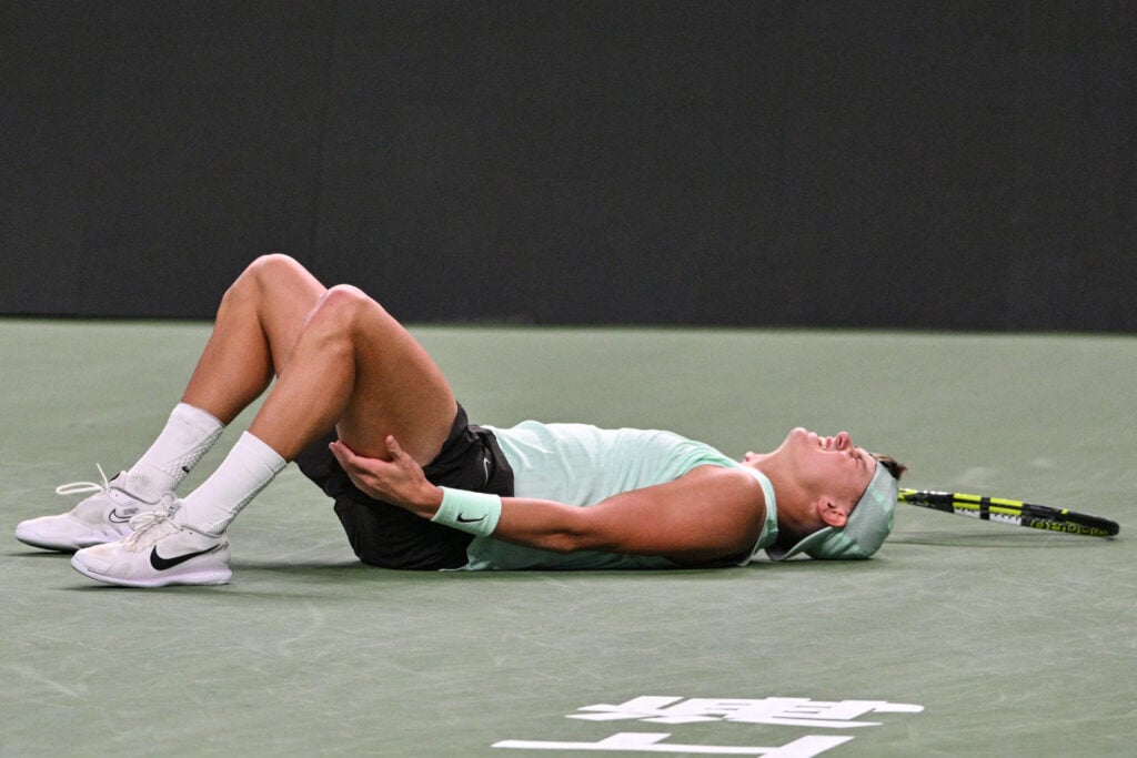 Denmark's Holger Rune reacts during his quarter-final men's singles match against Monaco's Valentin Vacherot at the Shanghai Masters tennis tournament in Shanghai on October 9, 2025.