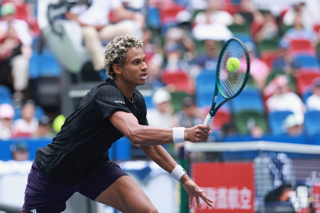 Gabriel Diallo of Canada returns a shot against Zizou Bergs of Belgium in the Men's singles round of 16 match on Day 9 of 2025 Shanghai Rolex Masters at Qi Zhong Tennis Center on October 07, 2025 in Shanghai, China.
