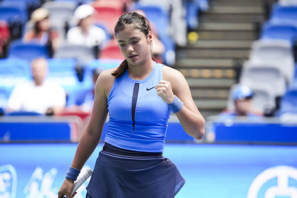 Emma Raducanu of Great Britain reacts in the Women's Singles Round of 64 match against Ann Li of United States on day 4 of 2025 Wuhan Open at Optics Valley International Tennis Center on October 7, 2025 in Wuhan, Hubei Province of China.