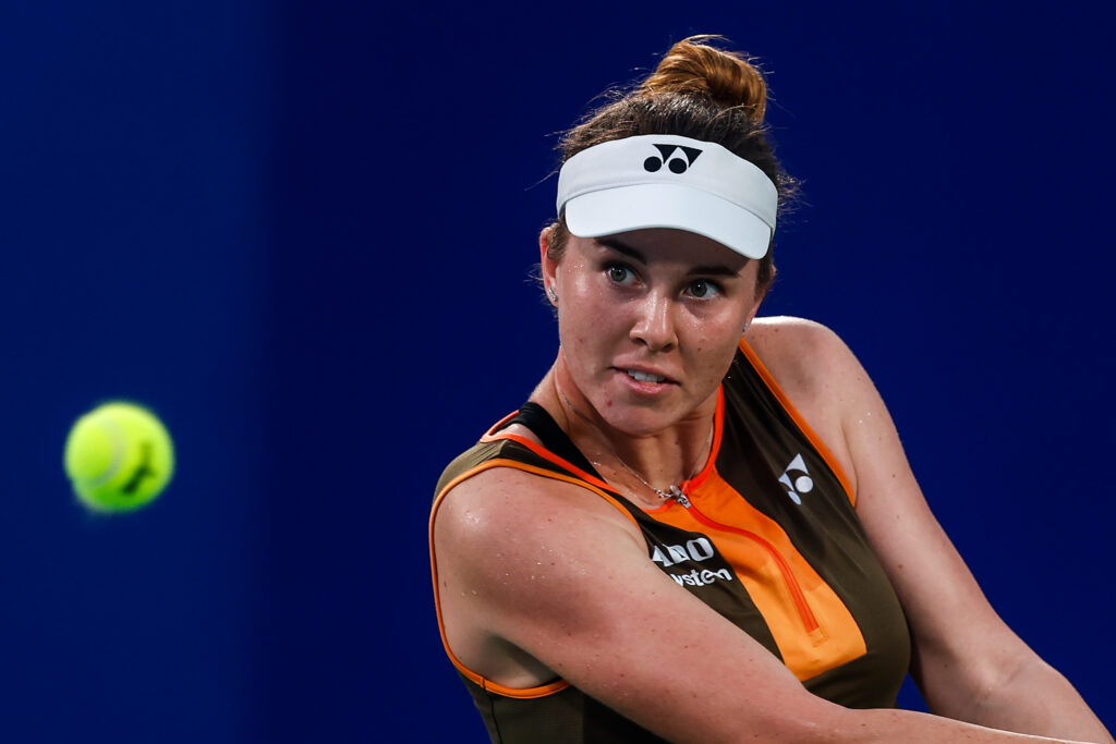 Linda Noskova of Czech returns a shot against Naomi Osaka of Japan in the women's singles round of 32 match during day five of the 2025 Wuhan Open at Optics Valley International Tennis Center on October 8, 2025 in Wuhan, China.