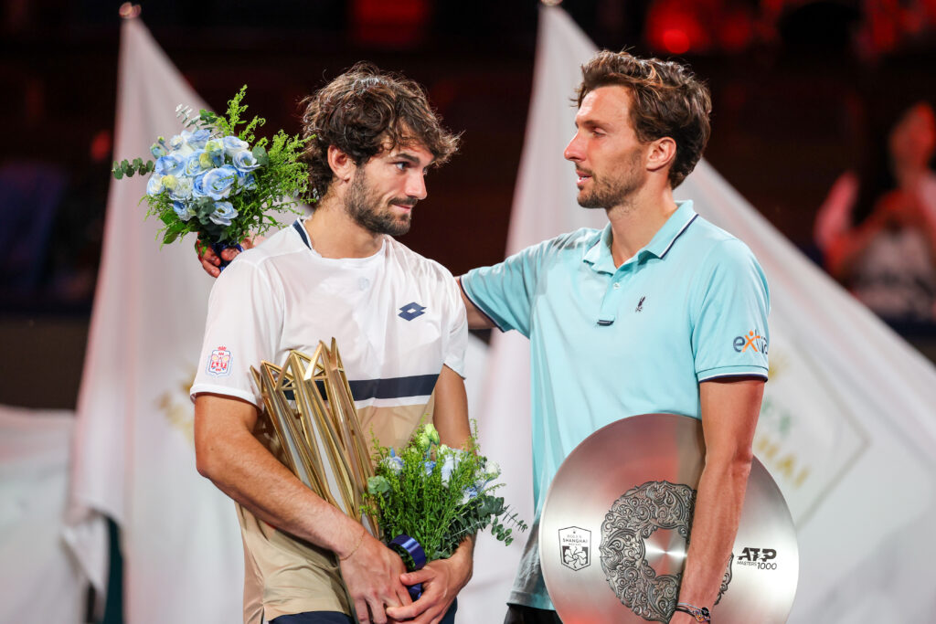 Valentin Vacherot of Monaco and Arthur Rinderknech of France pose with their winner's trophy during medal ceremony after the Men's singles final on day 14 of the 2025 Shanghai Rolex Masters at Qi Zhong Tennis Center on October 12, 2025 in Shanghai, China.