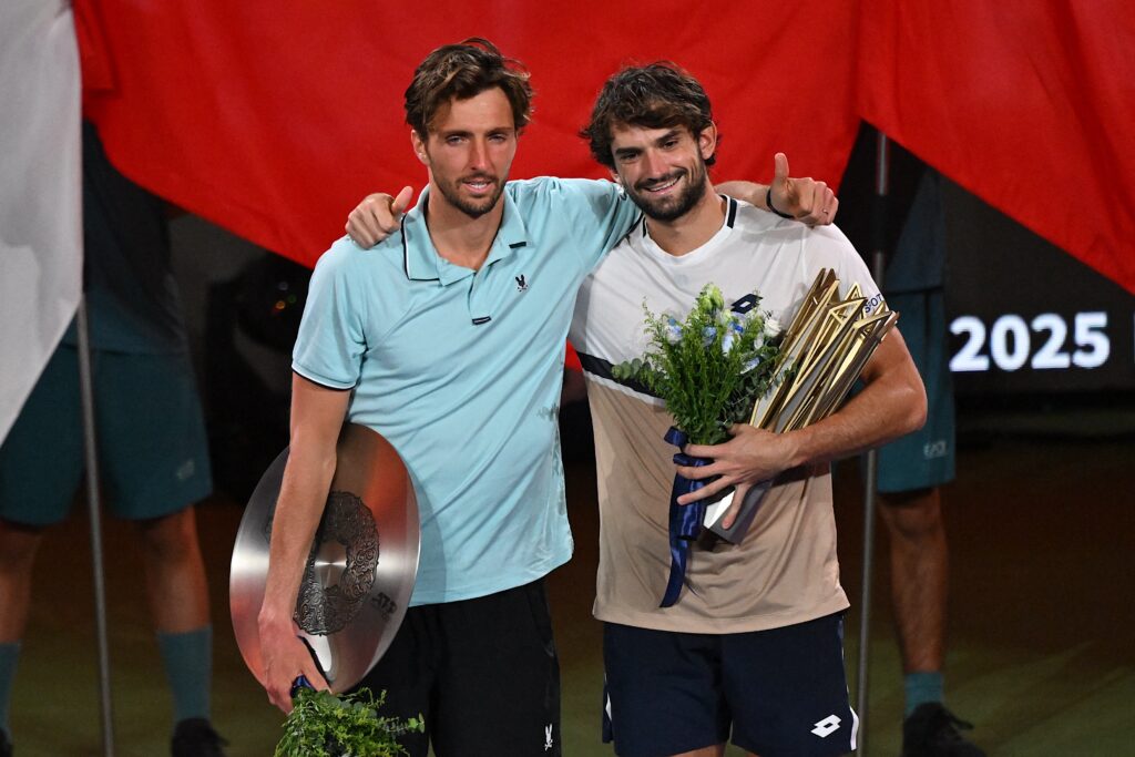 Runner-up France's Arthur Rinderknech (L) and Monaco's Valentin Vacherot react during the presentation ceremony of the men's singles final at the Shanghai Masters tennis tournament in Shanghai on October 12, 2025.