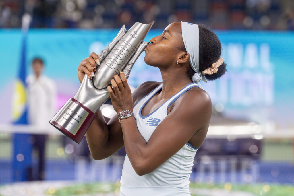Coco Gauff of United States poses for photo with the trophy after winning against Jessica Pegula of the United States during the Women's Singles Final match award ceremony on Day 9 of the Wuhan Open at Optics Valley International Tennis Center on October 12, 2025 in Wuhan, China.