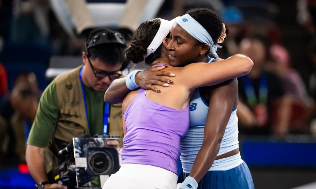 Jessica Pegula of the United States and Coco Gauff of the United States embrace at the net after the singles final on Day 9 of the Wuhan Open at Optics Valley International Tennis Center on October 12, 2025 in Wuhan, China