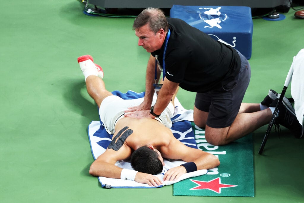 Novak Djokovic of Serbia receives treatment in the Men's Singles Semifinal match against Valentin Vacherot of Monaco on day 13 of 2025 Shanghai Rolex Masters at Qi Zhong Tennis Center on October 11, 2025 in Shanghai, China.