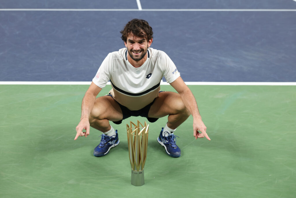 Valentin Vacherot of Monaco poses with his winner's trophy during medal ceremony after winning his match against Arthur Rinderknech of France in the Men's singles final on day 14 of the 2025 Shanghai Rolex Masters at Qi Zhong Tennis Center on October 12, 2025 in Shanghai, China.