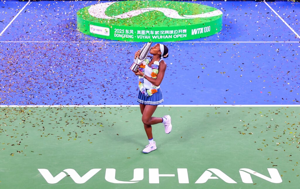 Champion Coco Gauff of the United States kisses the trophy at the award ceremony after winning the Women's Singles Final match against Jessica Pegula of the United States on day 9 of 2025 Wuhan Open at Optics Valley International Tennis Center on October 12, 2025 in Wuhan, Hubei Province of China.