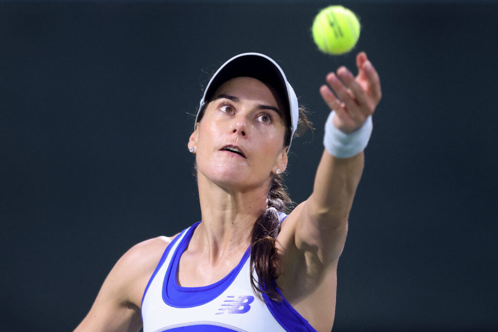 Romania's Sorana Cirstea serves to Britain's Katie Boulter during their women's singles match at the Japan Open tennis tournament in Osaka on October 15, 2025.