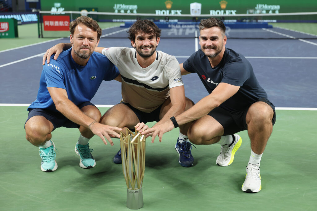 Valentin Vacherot of Monaco poses with team celebrates after winning his match against Arthur Rinderknech of France in the Men's singles final on day 14 of the 2025 Shanghai Rolex Masters at Qi Zhong Tennis Center on October 12, 2025 in Shanghai, China