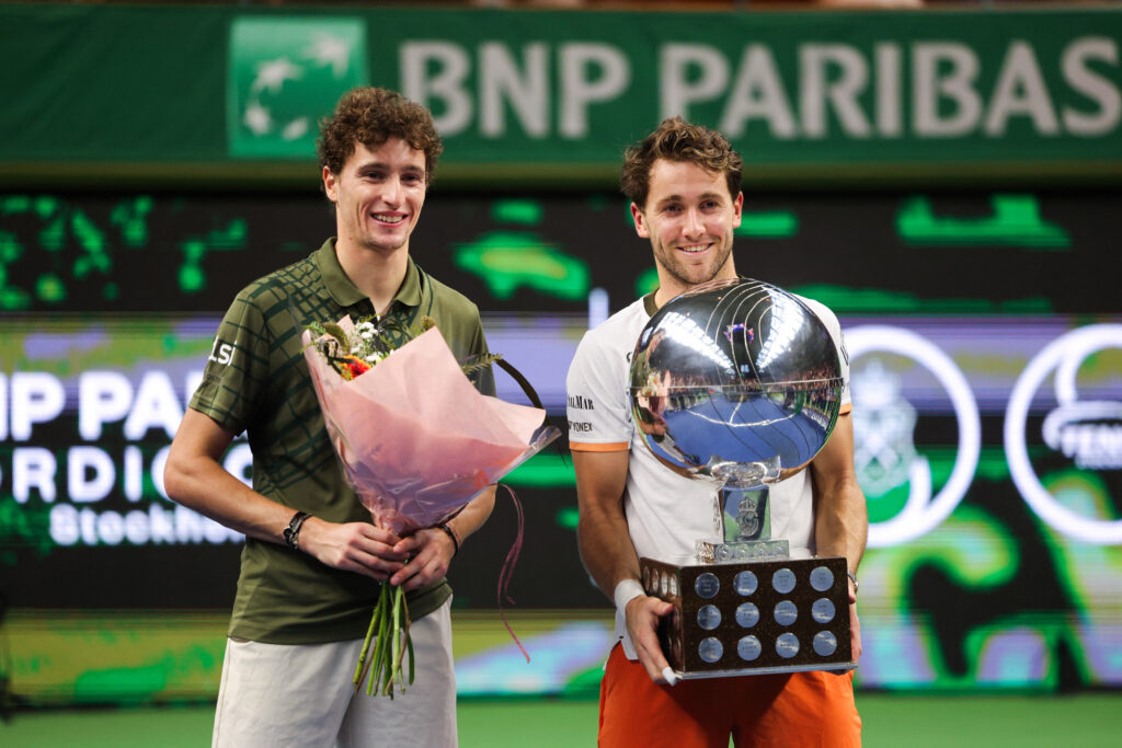 Norway's Casper Ruud (R) poses with France's Ugo Humbert after their singles final match of the BNP Paribas Nordic Open tennis tournament at the Royal Swedish Tennis Hall in Stockholm, Sweden, on October 19, 2025.