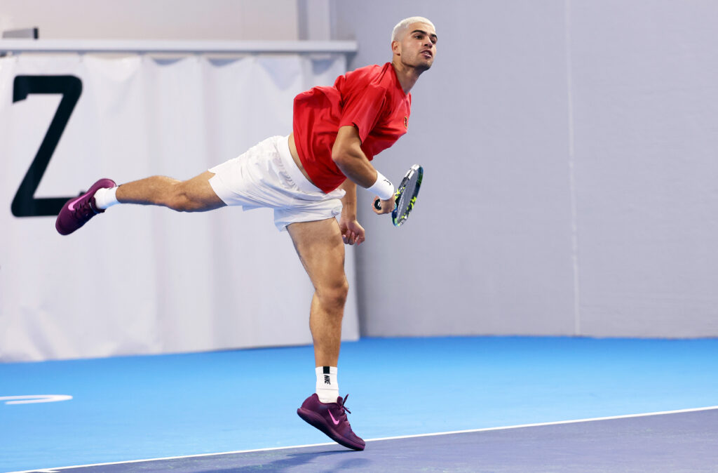 Carlos Alcaraz of Spain serves during a practice session at El Palmar prior to his final ATP Masters Series event of the year in Paris on October 22, 2025 in Murcia, Spain.
