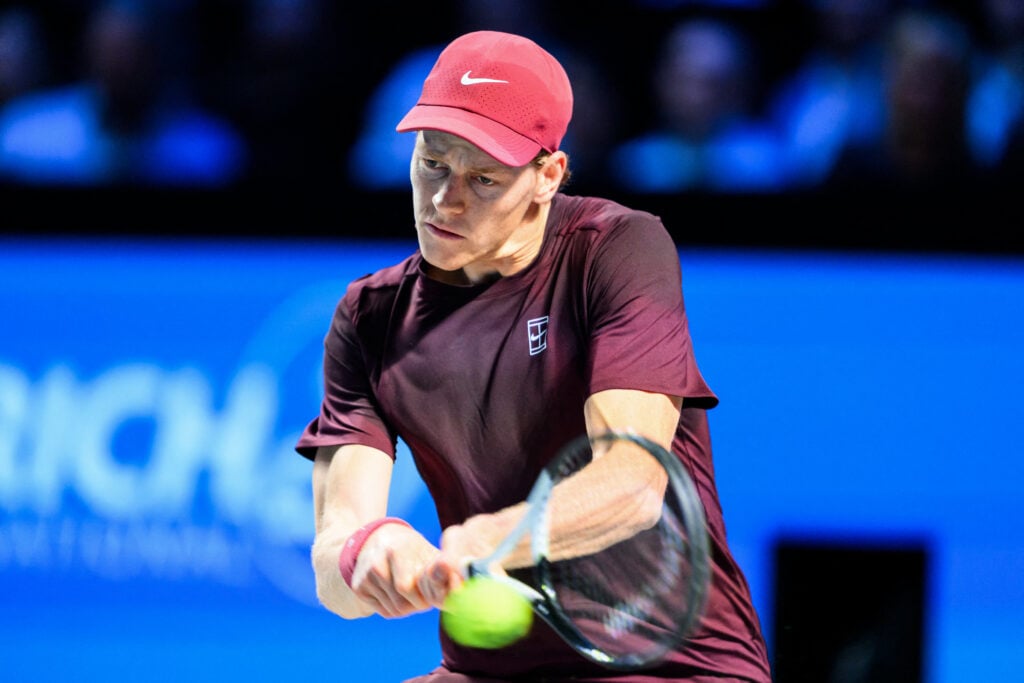 Italy's Jannik Sinner returns the ball to Australia's Alex de Minaur during the men's semi-final singles match at the ATP Vienna Open tennis tournament in Vienna, Austria, on October 25, 2025.