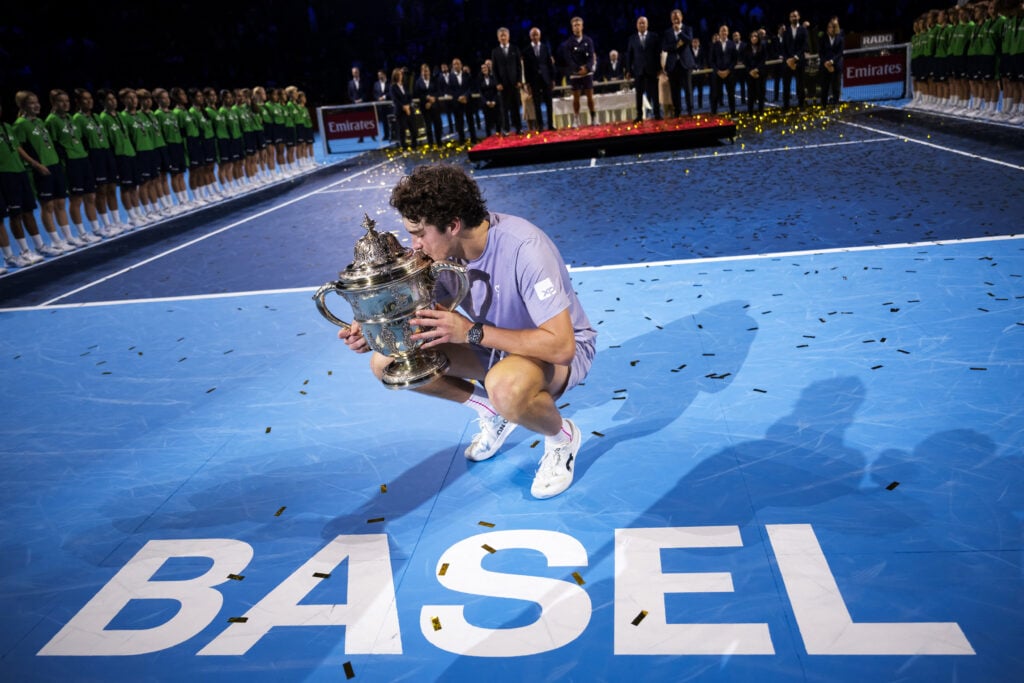 Brazil's Joao Fonseca kisses the trophy after winning against Spain's Alejandro Davidovich Fokina in their men's final match at the Swiss Indoors ATP 500 tennis tournament in Basel on October 26, 2025.