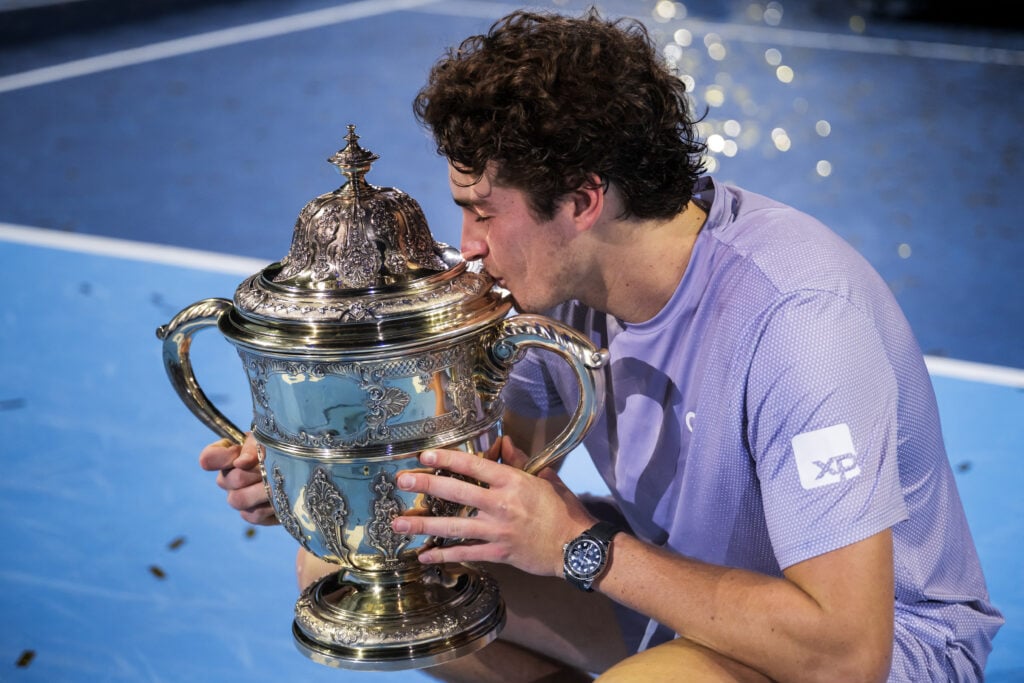 Brazil's Joao Fonseca kisses the trophy after winning against Spain's Alejandro Davidovich Fokina in their men's final match at the Swiss Indoors ATP 500 tennis tournament in Basel on October 26, 2025.