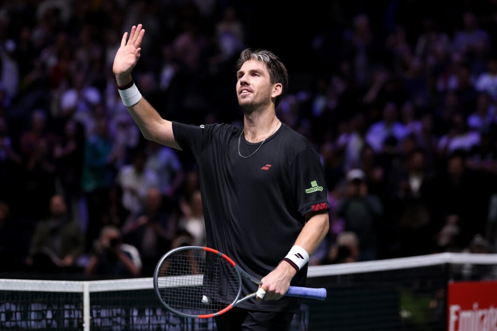 Cameron Norrie of Great Britain acknowledges the fans after winning match point in the second round match against Carlos Alcaraz of Spain on day two of the Rolex Paris Masters 2025 on October 28, 2025 in Nanterre, France.