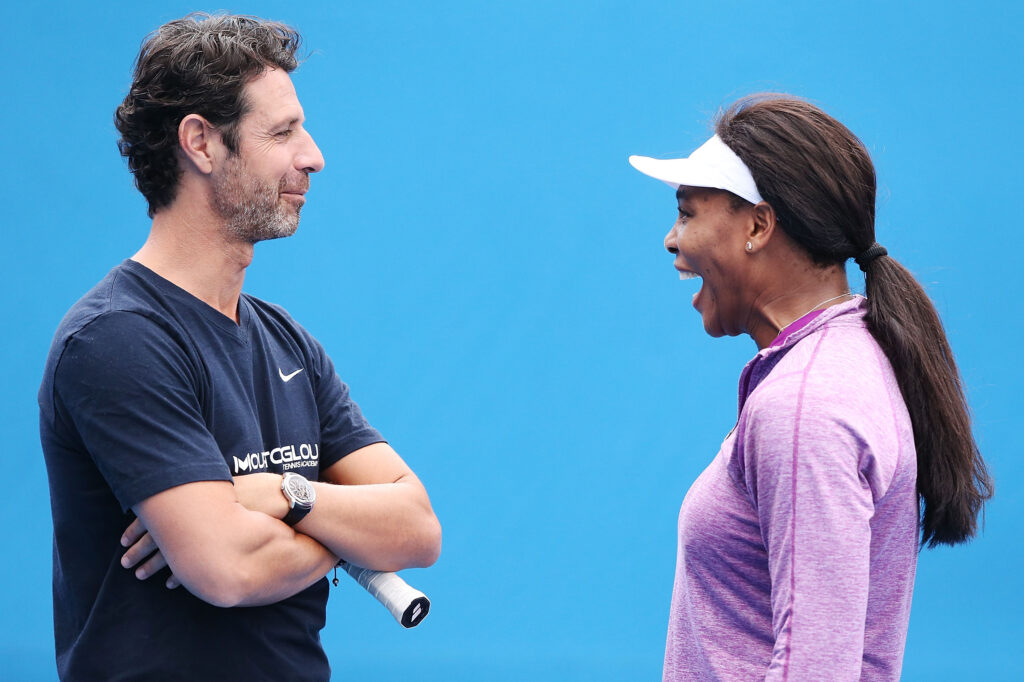 Serena Williams of the USA reacts with her coach Patrick Mouratoglou during a practice session ahead of the 2015 Australian Open at Melbourne Park on January 17, 2015 in Melbourne, Australia.