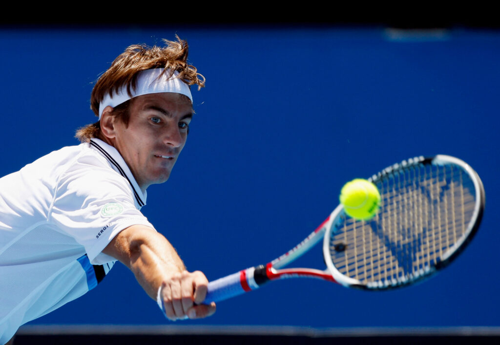 Tommy Robredo of Spain plays a backhand during his first round match against Mischa Zverev of Germany on day one of the Australian Open 2008 at Melbourne Park on January 14, 2008 in Melbourne, Australia.