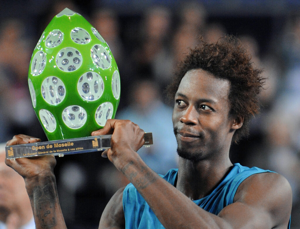 France's Gael Monfils holds his trophy after winning the Moselle Tennis Open final match against Germany's Philipp Kohlschreiber, on September 27th, 2009 in Metz. Monfils won 7/6, 3/6, 6/2.