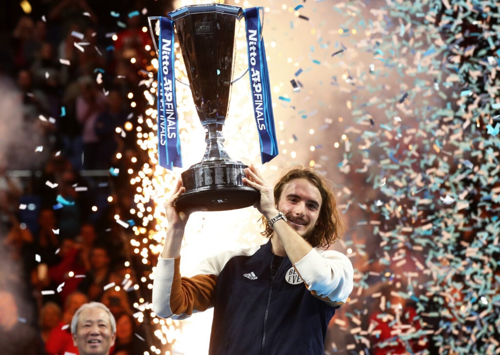 Stefanos Tsitsipas of Greece lifts the trophy after his singles final match victory against Dominic Thiem of Austria during Day Eight of the Nitto ATP Finals at The O2 Arena on November 17, 2019 in London, England.