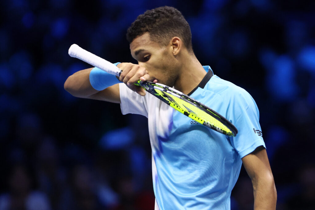 Felix Auger-Aliassime of Canada looks dejected at the match between Felix Auger-Aliassime of Canada and Taylor Fritz of USA during day five of the Nitto ATP Finals.