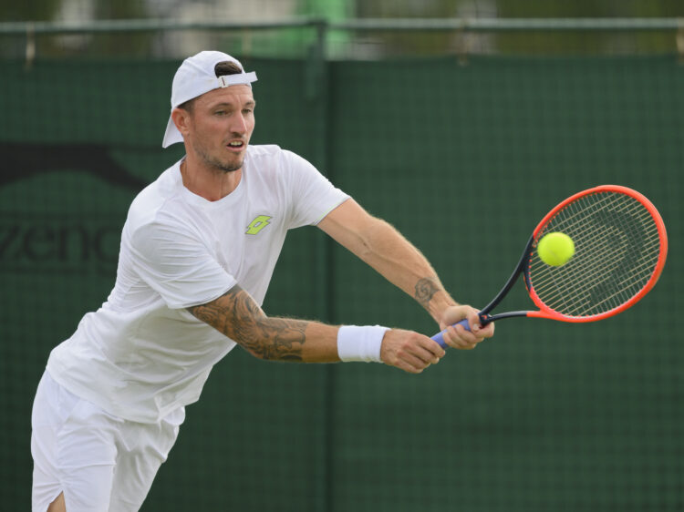 LONDON, ENGLAND - JUNE 28: Dennis Novak (AUT) in action  against  Charles Broom  (GBR) during his gentleman's second round singles match qualifying...