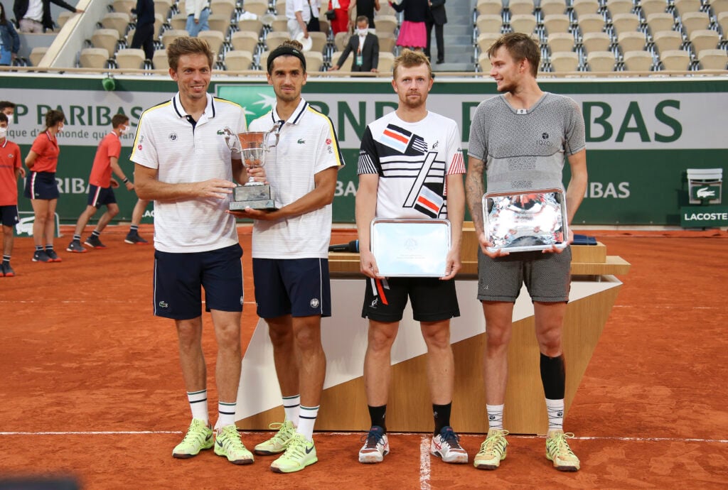 Winners Nicolas Mahut and Pierre-Hughes Herbert of France, finalists Andrey Golubev and Alexander Bublik of Kazakhstan during the Men's Doubles final trophy ceremony on day 14 of the French Open 2021, Roland-Garros 2021, Grand Slam tennis tournament at Roland Garros stadium on June 12, 2021 in Paris, France.