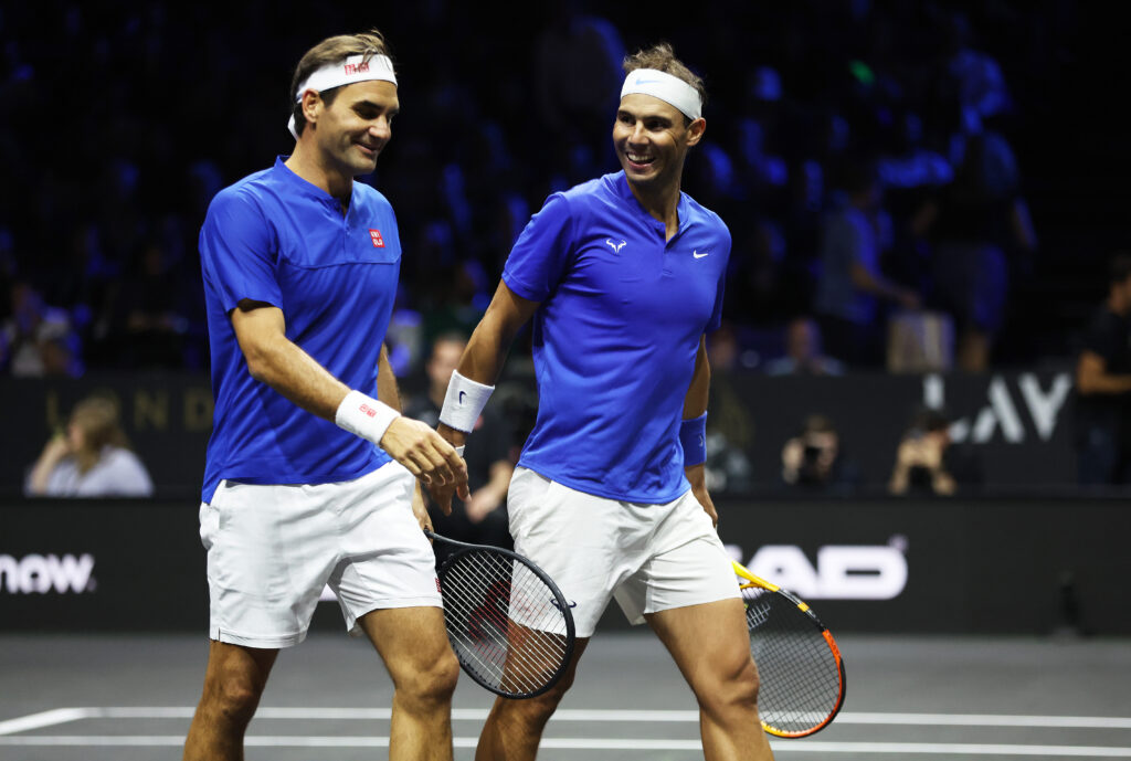 Roger Federer and Rafael Nadal of Team Europe interact during the doubles match between Jack Sock and Frances Tiafoe of Team World and Roger Federer and Rafael Nadal of Team Europe during Day One of the Laver Cup.