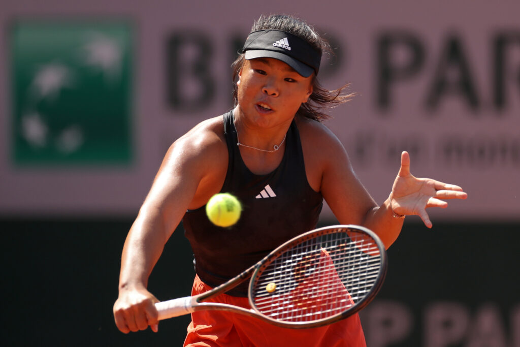 Mingge Xu of Great Britain plays a backhand against Kaitlin Quevedo of United States during the Girls Juniors Singles First Round match on Day Nine of the 2023 French Open at Roland Garros on June 05, 2023 in Paris, France.