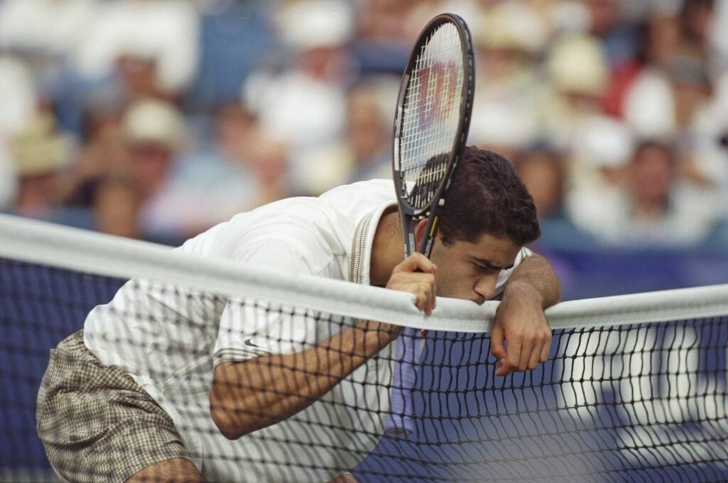 Pete Sampras of the USA kissing the net during the US Open, at Fushing Meadow, New York, USA.