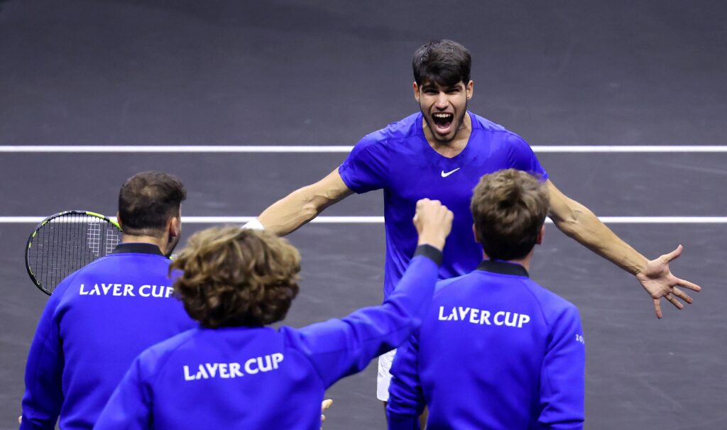 Carlos Alcaraz of Team Europe celebrates after winning match and championship point with Casper Ruud, Grigor Dimitrov and Stefanos Tsitsipas of Team Europe.