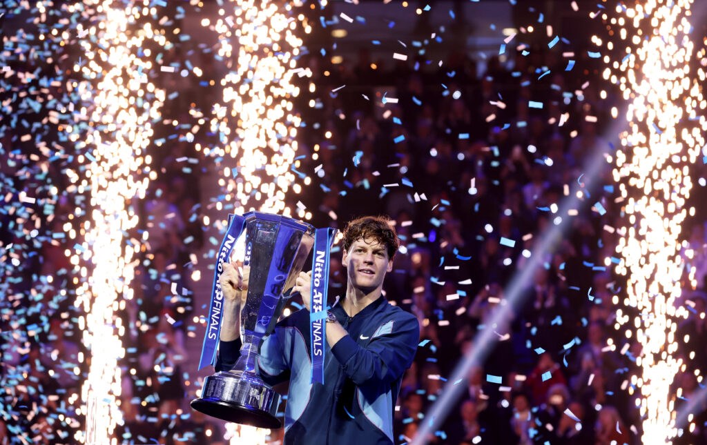 Jannik Sinner of Italy lifts the trophy after his victory against Taylor Fritz of United States during the Men's Singles final match on day eight of the Nitto ATP finals 2024 at Inalpi Arena on November 17, 2024 in Turin, Italy.