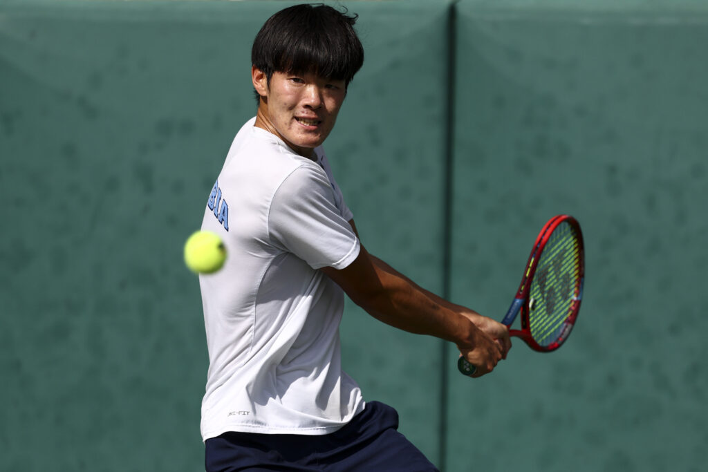 Michael Zheng of the Columbia Lions competes against Ozan Baris of the Michigan State Spartans during the Division I Mens Tennis Championship held at The Hurd Tennis Center on November 24, 2024 in Waco, Texas.